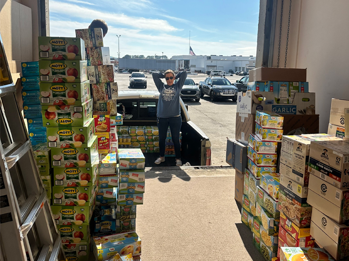 Book Systems food drive community involvement